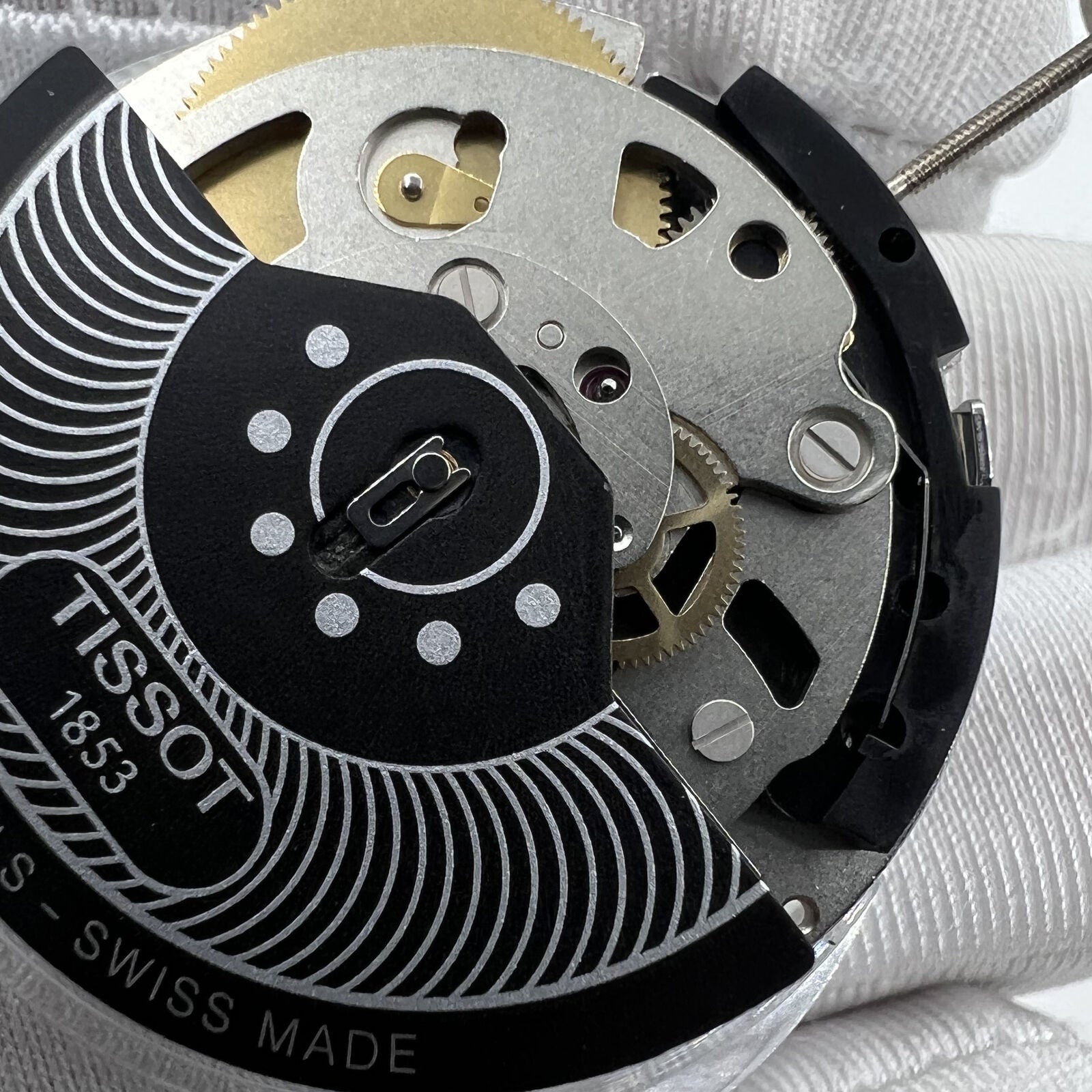 Swiss Made ETA C01.211 chronograph watch movement with 1853 black dial for precision timekeeping.