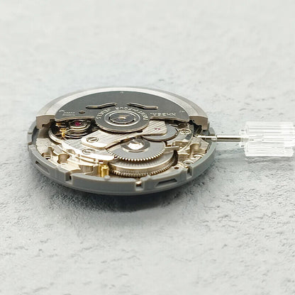 Japan Made NH36 automatic watch movement showcasing Arabic date dial and crown at 3 o'clock, precise and durable for Seiko accessories.