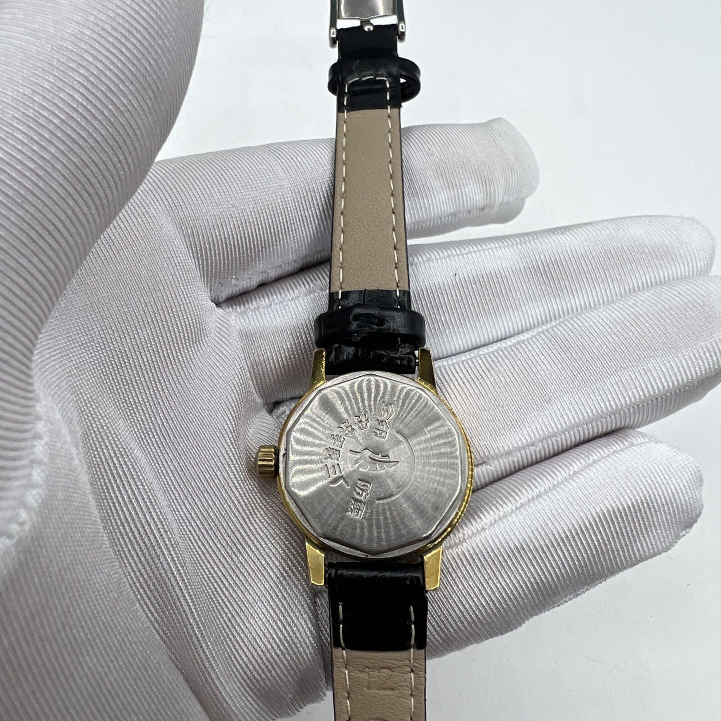 27mm Kongque silver dial watch with golden markers, 19-jewel manual mechanical movement, elegant China-made timepiece.