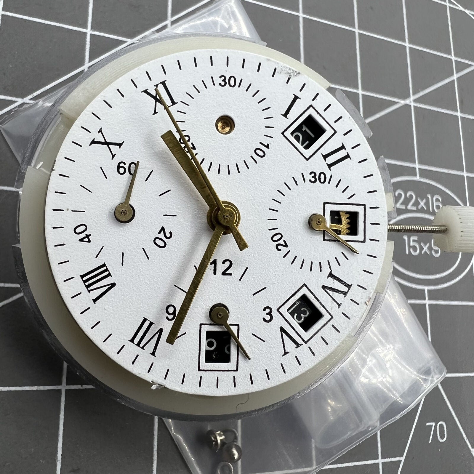 Automatic chronograph watch with ETA 7750 movement, black dial, calendar at 4:30, seconds at 9, precision timing.