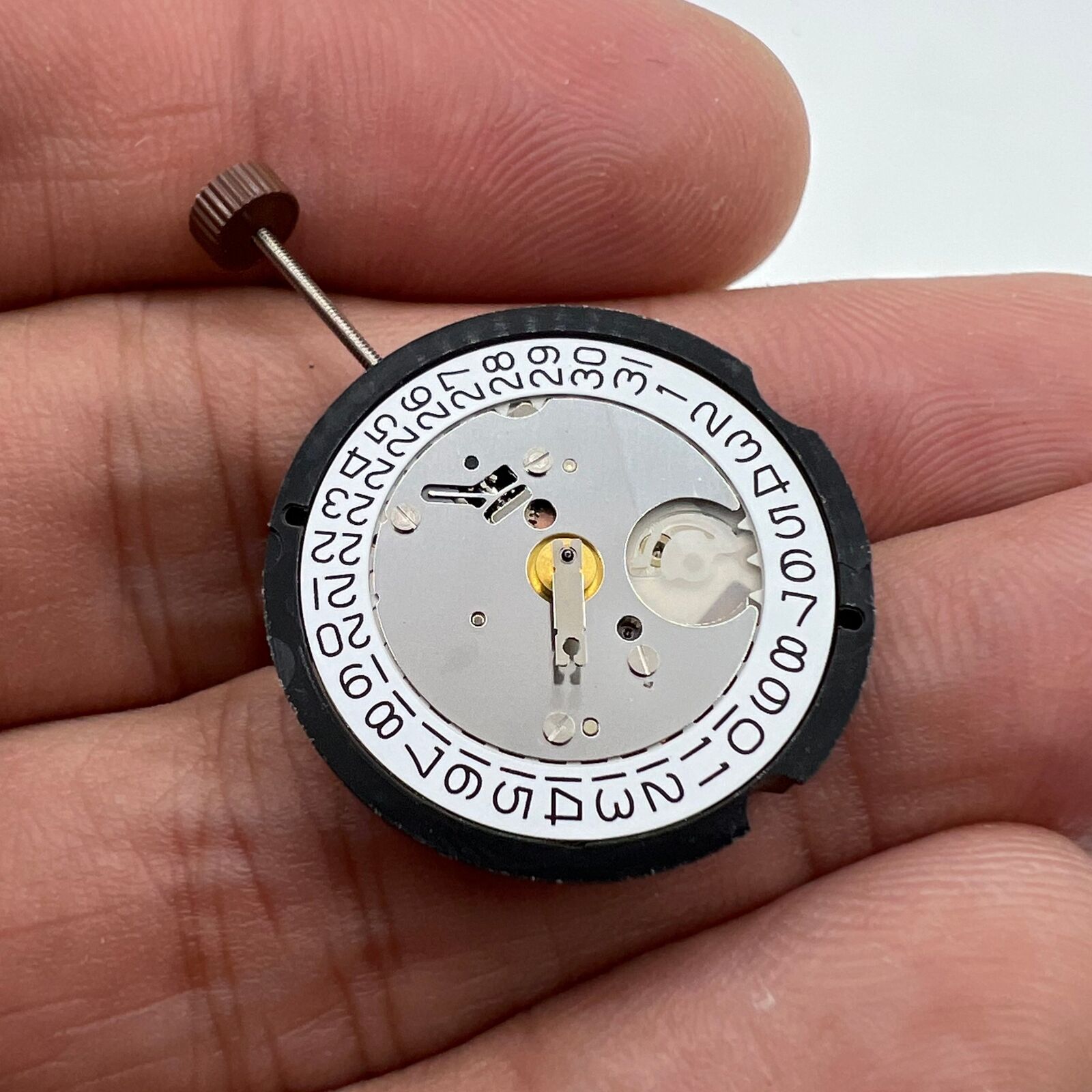 Ronda 505 quartz watch movement featuring date display at 3 o'clock, Swiss precision parts.