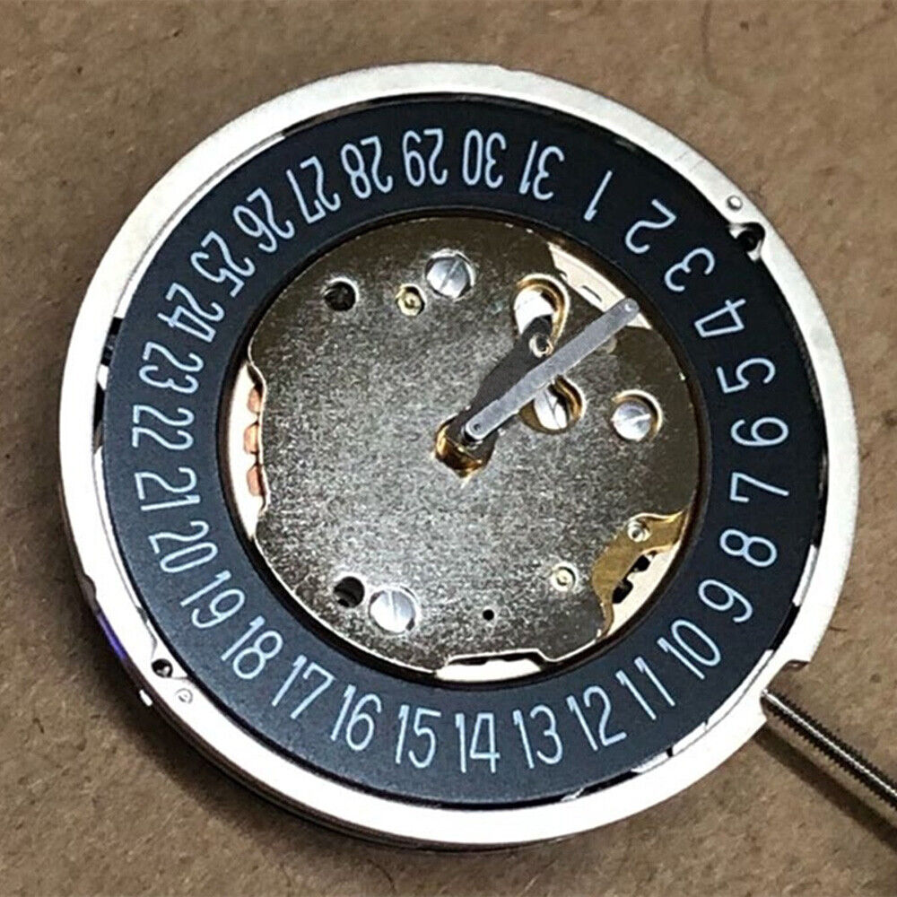 Swiss Part Ronda 5021.D watch movement with 5 hands, black date wheel at 6 o'clock, precise timekeeping.