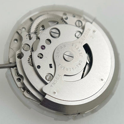 Epson YN56 mechanical watch movement displaying day and date, precision Japan brand quality.