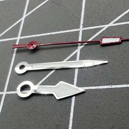 Silver arrow-shaped watch hands with red second hand and green lume, compatible with NH35 NH36 movements, for precise timekeeping.