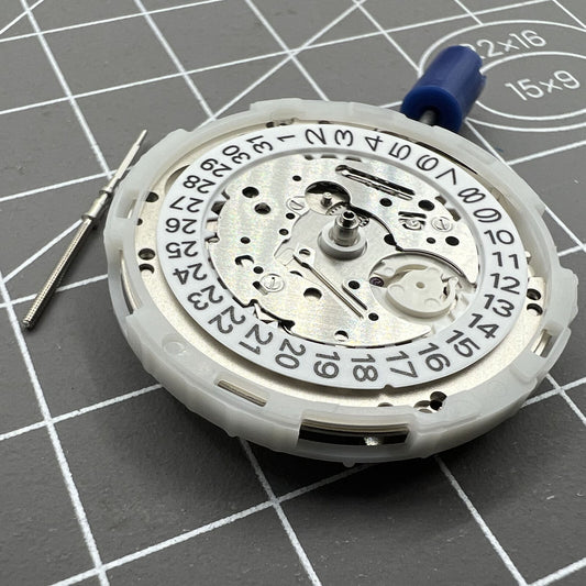 Japan Epson YN55 watch movement showing mechanical parts and single calendar function