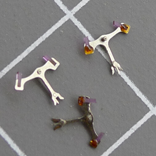 Pallet fork for Shanghai 7753 watch movement, precision part enhancing timekeeping accuracy.