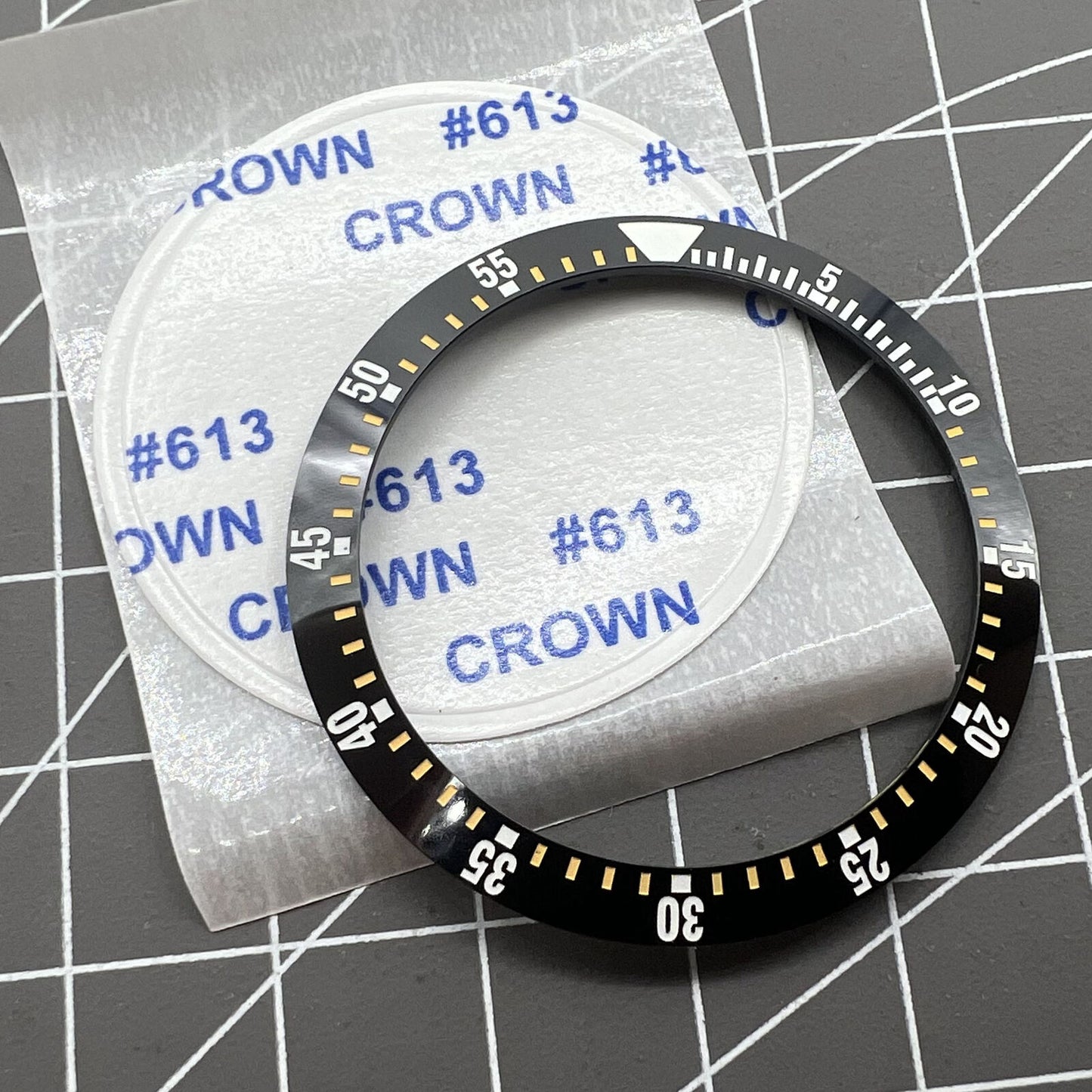 Black ceramic watch bezel insert with yellow graduation for 38mm/30.5mm watches, durable replacement part.