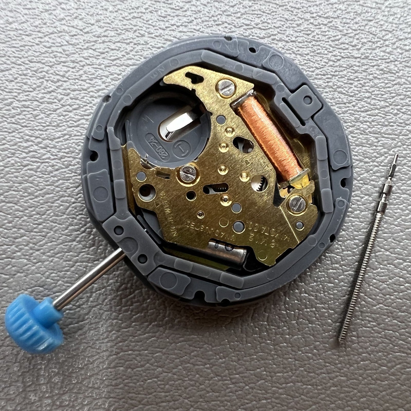 Miyota Japan 6M12 quartz movement watch with date at 6 o'clock and three hands, precise timing