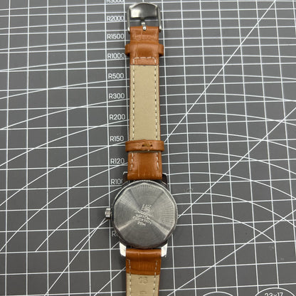 Shanghai Factory 32mm manual mechanical watch with silver case and hour markers, classic elegant design for everyday wear.