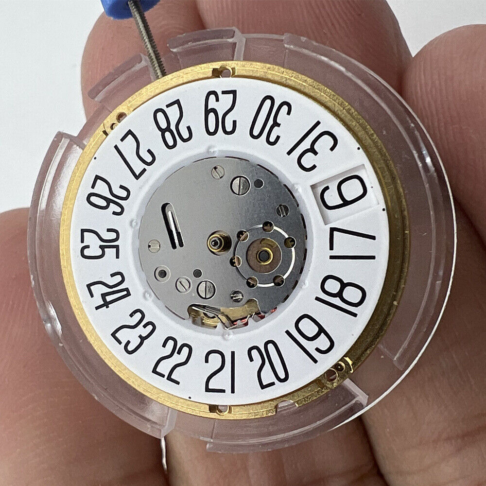 ETA F06.161 quartz watch movement with 3 hands, white dial, date windows at 3 and 6 by ETA.