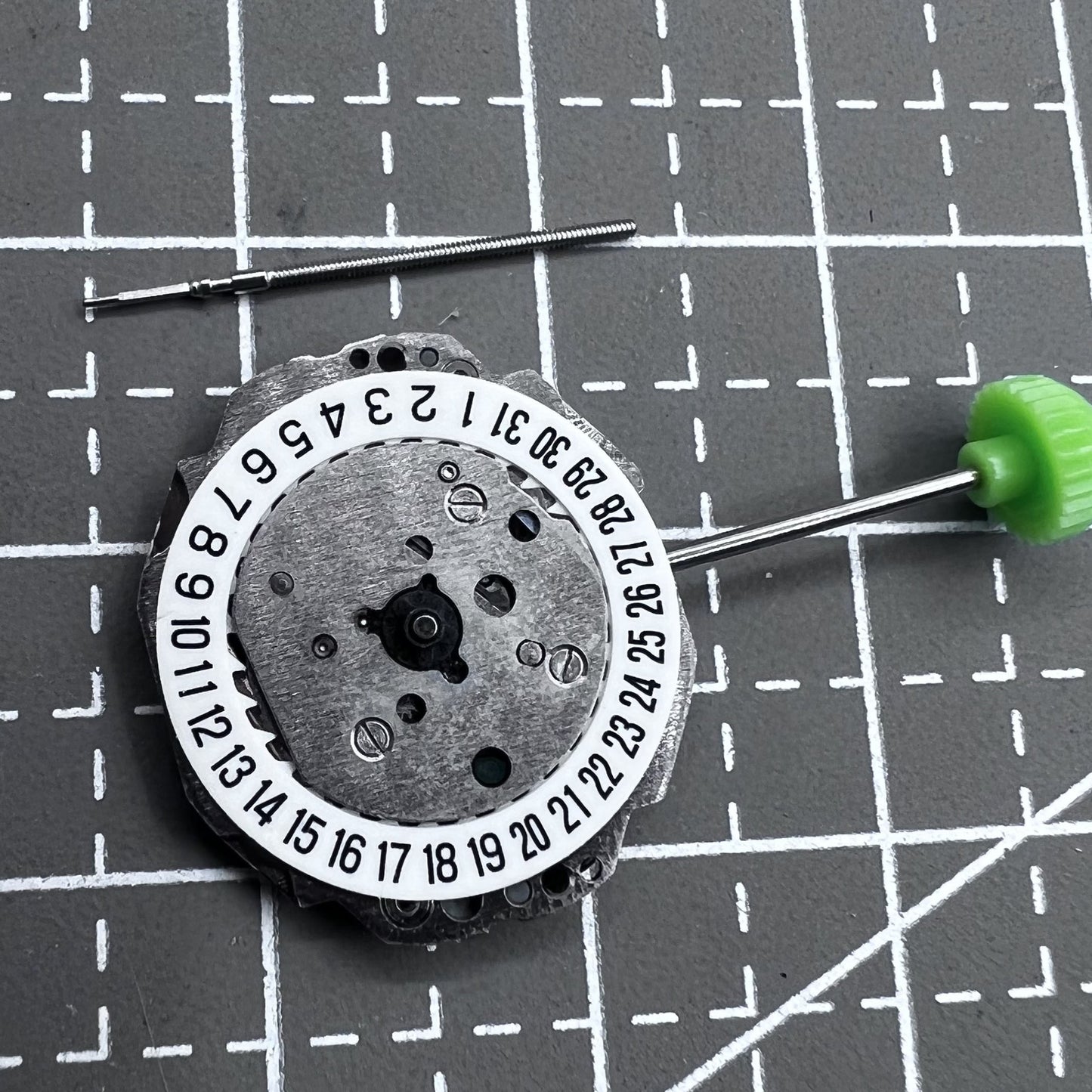 Miyota Japan 4T74 quartz movement with single hand and date at 6 o?clock, ideal for precise watch repairs.