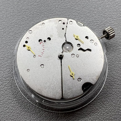 Tianjin ST17 T17 hand-wound watch movement with two hands and power reserve indicator at 10 o'clock.