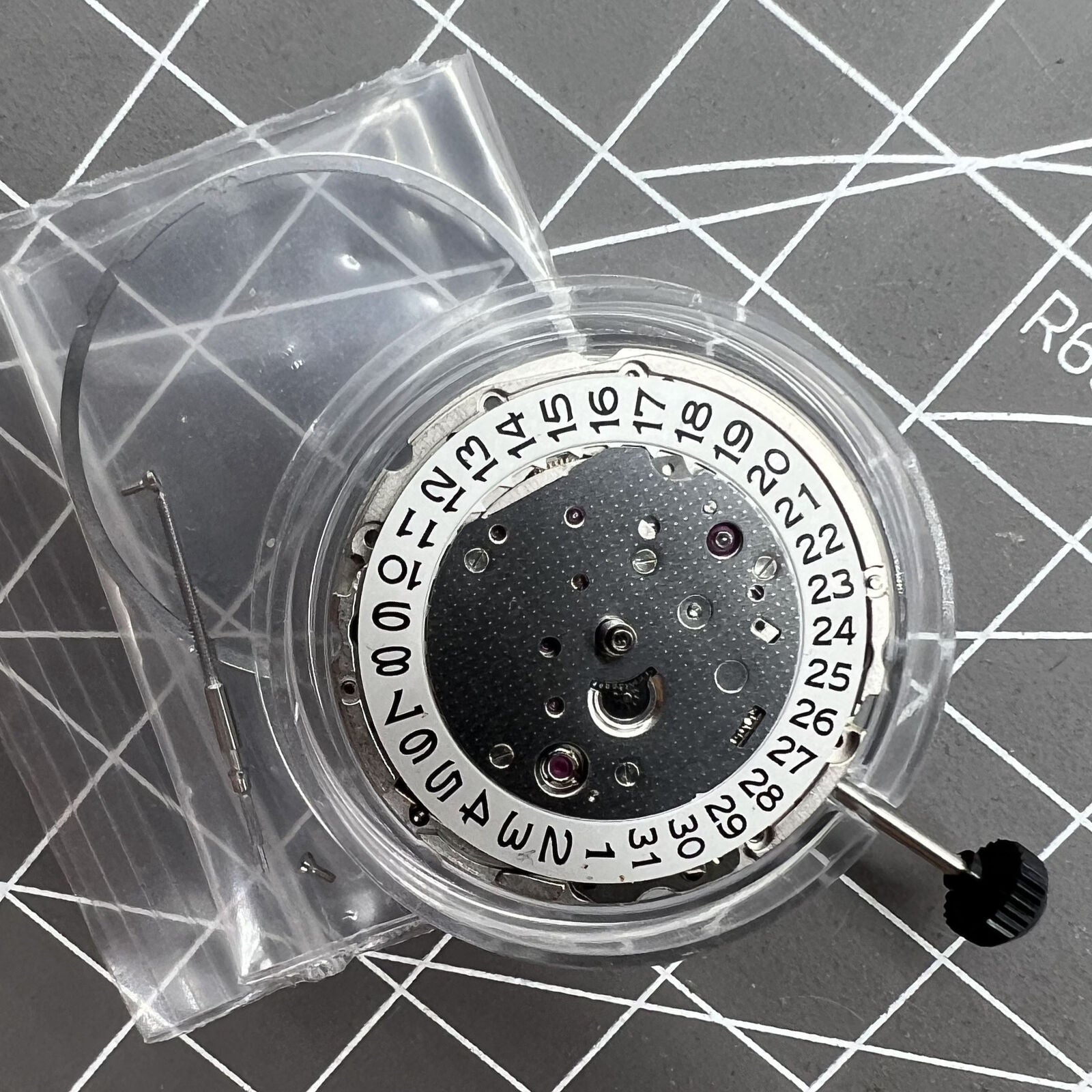 Miyota Citizen 9010 automatic watch movement showing date display at 3 o'clock, ultra-thin design
