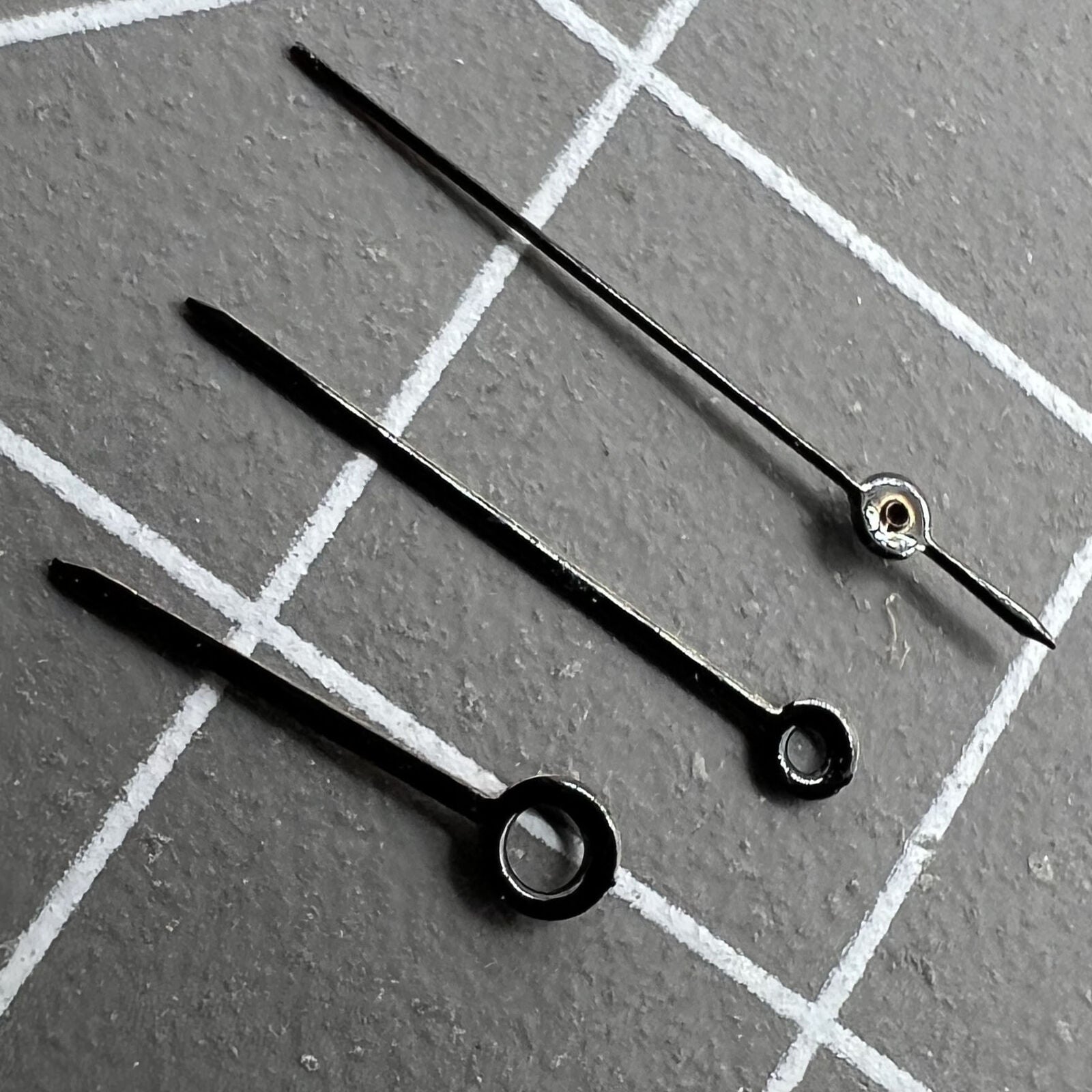 Black set of watch hands by NO.1519 for Miyota 2035 movement, 14mm/12mm/9mm lengths.