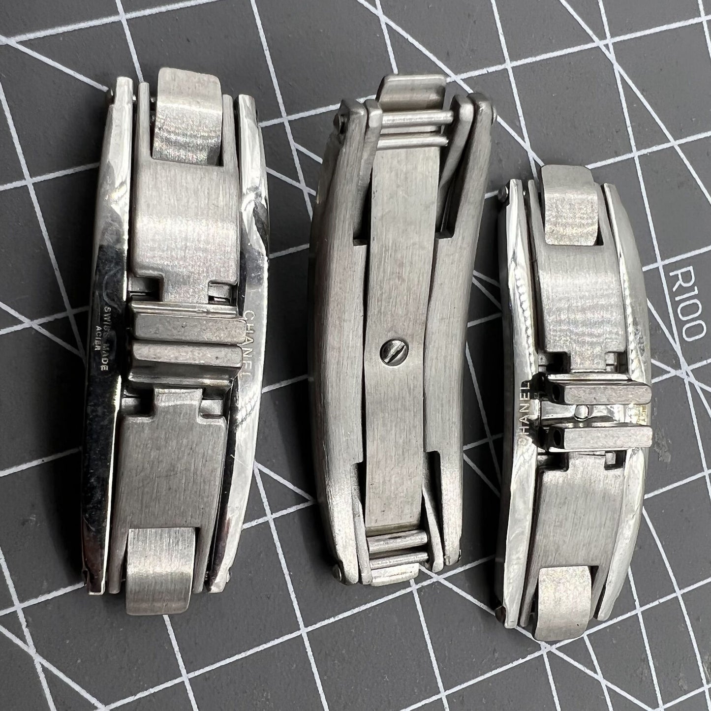 Set of 3 stainless steel ceramic butterfly clasps for J12 watch bands, durable and stylish.