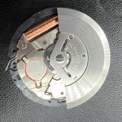 Seiko 5M62A quartz watch movement with date at 3 o'clock, reliable Japanese craftsmanship.