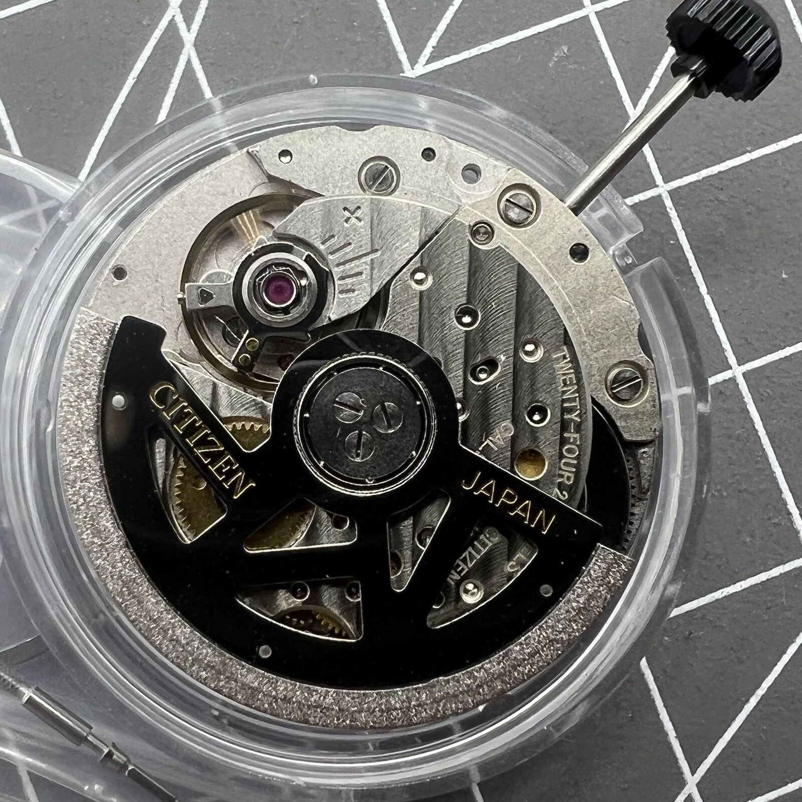 Miyota Citizen 9010 automatic watch movement with ultra-thin design and date display at 3 o'clock.