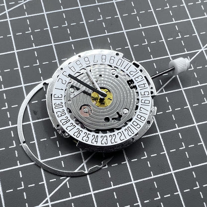 Swiss ISA 8171A quartz watch movement with white dial, four hands, and date at 6 o?clock for precise timekeeping.