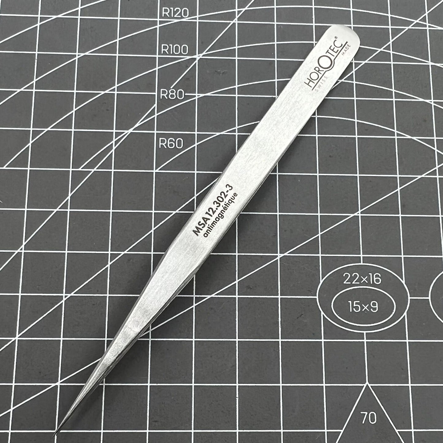 Swiss Horotec MSA12.302-3 antimagnetic fine tweezers for precise hairspring handling and watch repairs.