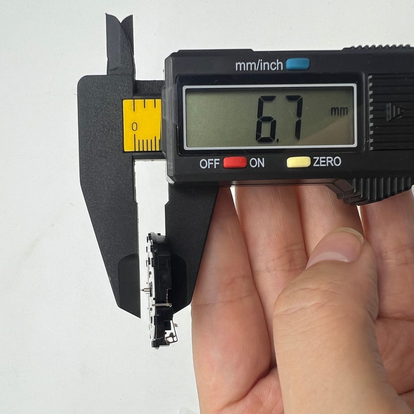 Hattori Epson TMI VD53C quartz watch movement showing date display at 6 o'clock for replacement accessories.