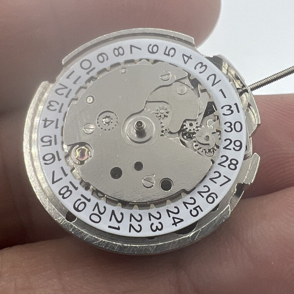 26.5mm Diameter 7120 automatic watch movement with single calendar and 3 hands for precise timekeeping.