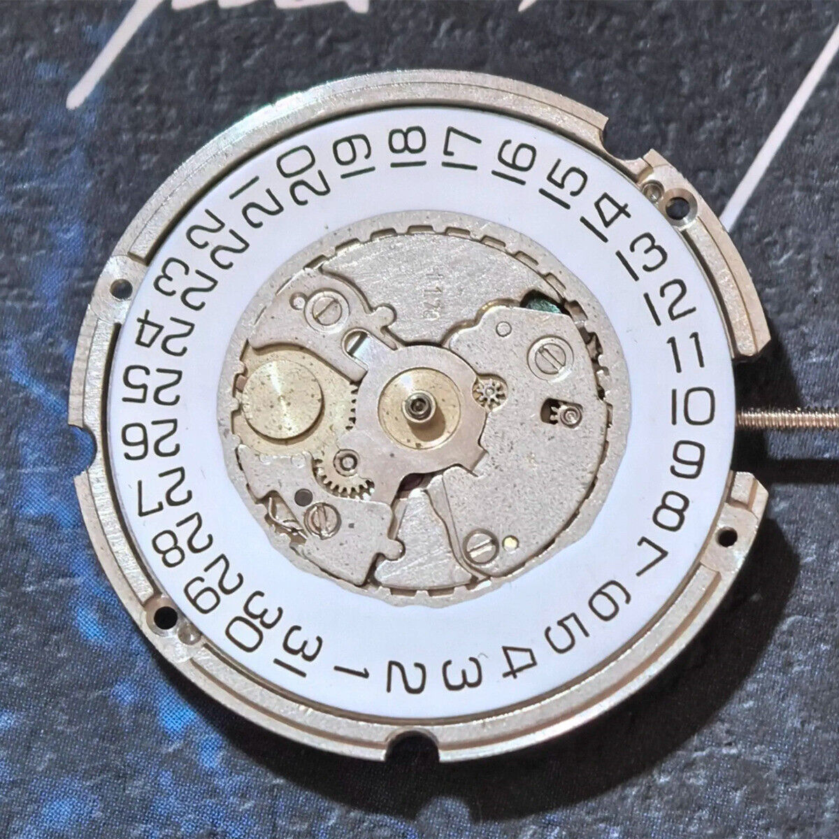 Swiss Made ETA 701.211 quartz watch movement with 3 hands, precision replacement part for watches.