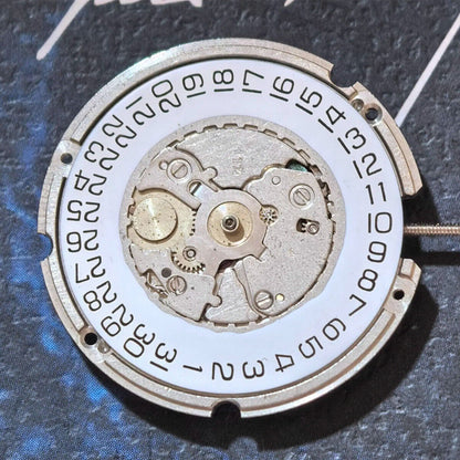 Swiss Made ETA 701.211 quartz watch movement with 3 hands, precision replacement part for watches.
