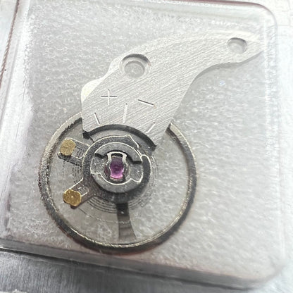 Complete Balance Wheel with splint for Miyota NH35 NH36 watch movement, precision Japanese craftsmanship by Miyota enhancing timekeeping accuracy.