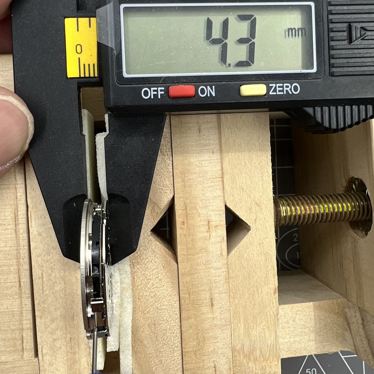 Swiss Ronda 5030D quartz watch movement showing date display at 4 o'clock for precision timing.