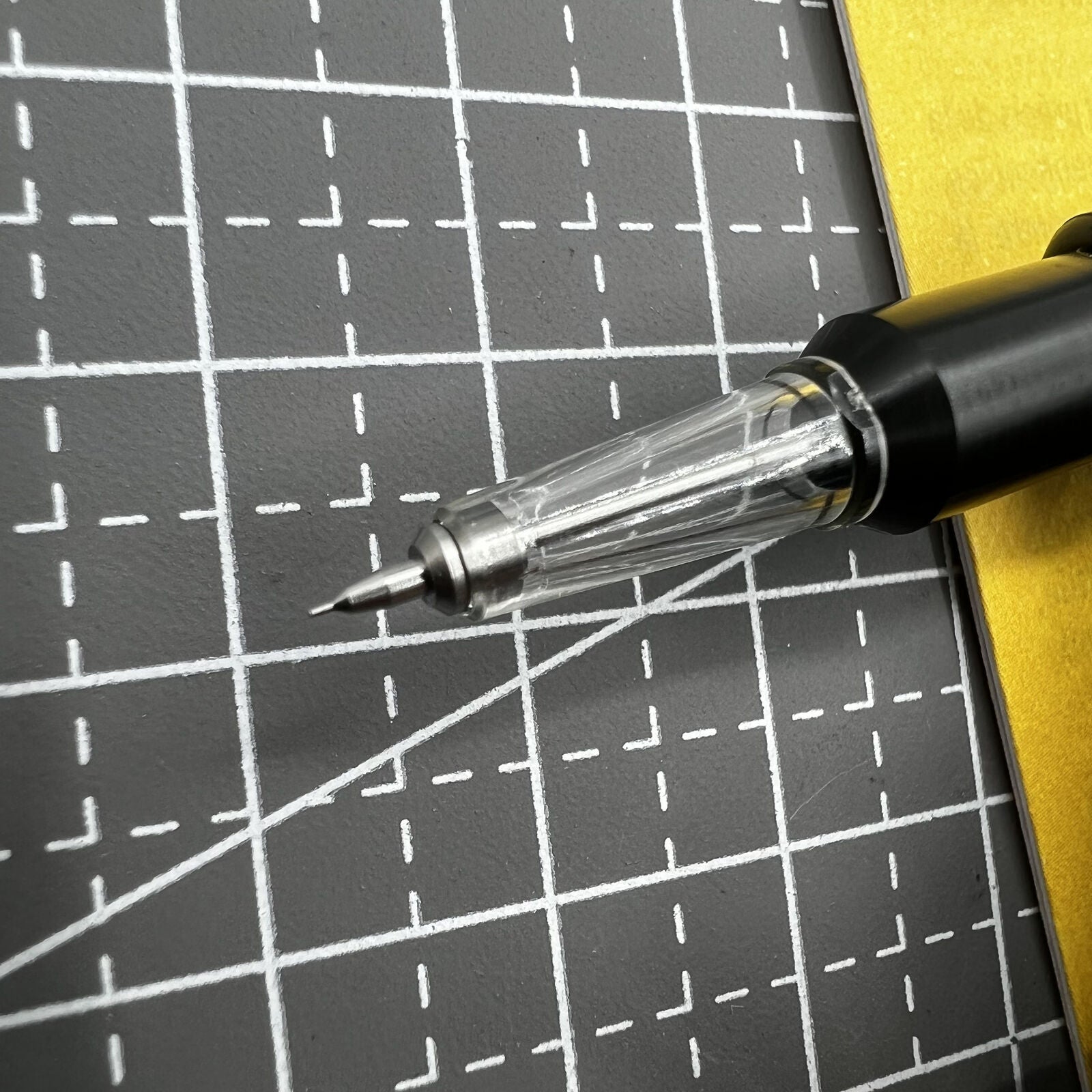 Swiss Tool Bergeon 7720-5 automatic watch oiler with fine tip for precise watch maintenance and repair tasks.