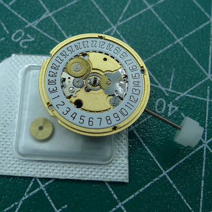 ETA 956.412 Swiss quartz watch movement with 3 hands and date display at 6 o'clock by ETA, perfect for precise watch repairs.