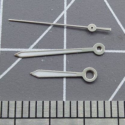 Arrow-shaped silver-trimmed watch hands for Miyota 2315 & 2035 movements, precise timekeeping upgrade.