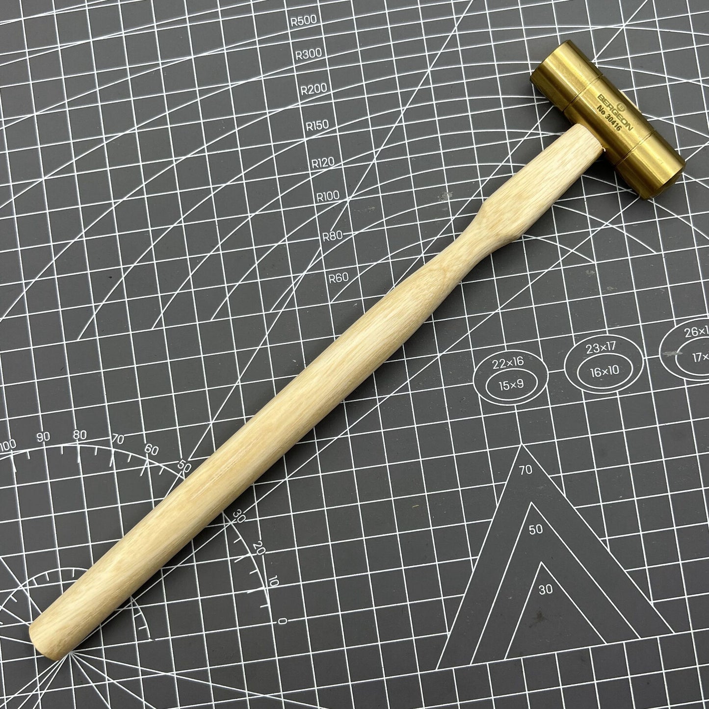 Swiss Made Bergeon 30416 brass hammer for precise watch accessory adjustments and repairs.