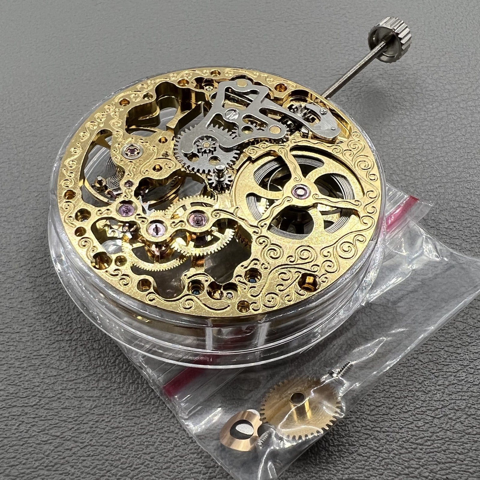 Golden Seagull ST3600 mechanical watch movement with hollow dial and second hand at 9 o?clock, precision engineering.