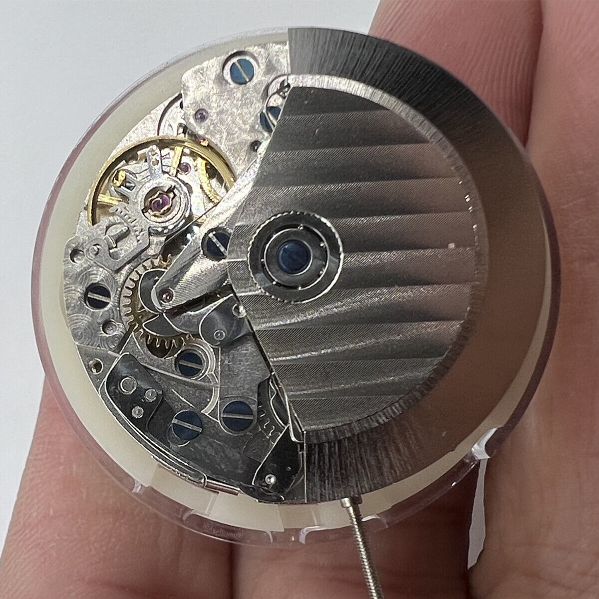Asian 7750 automatic chronograph movement with day-date at 3 o'clock, precise ETA design