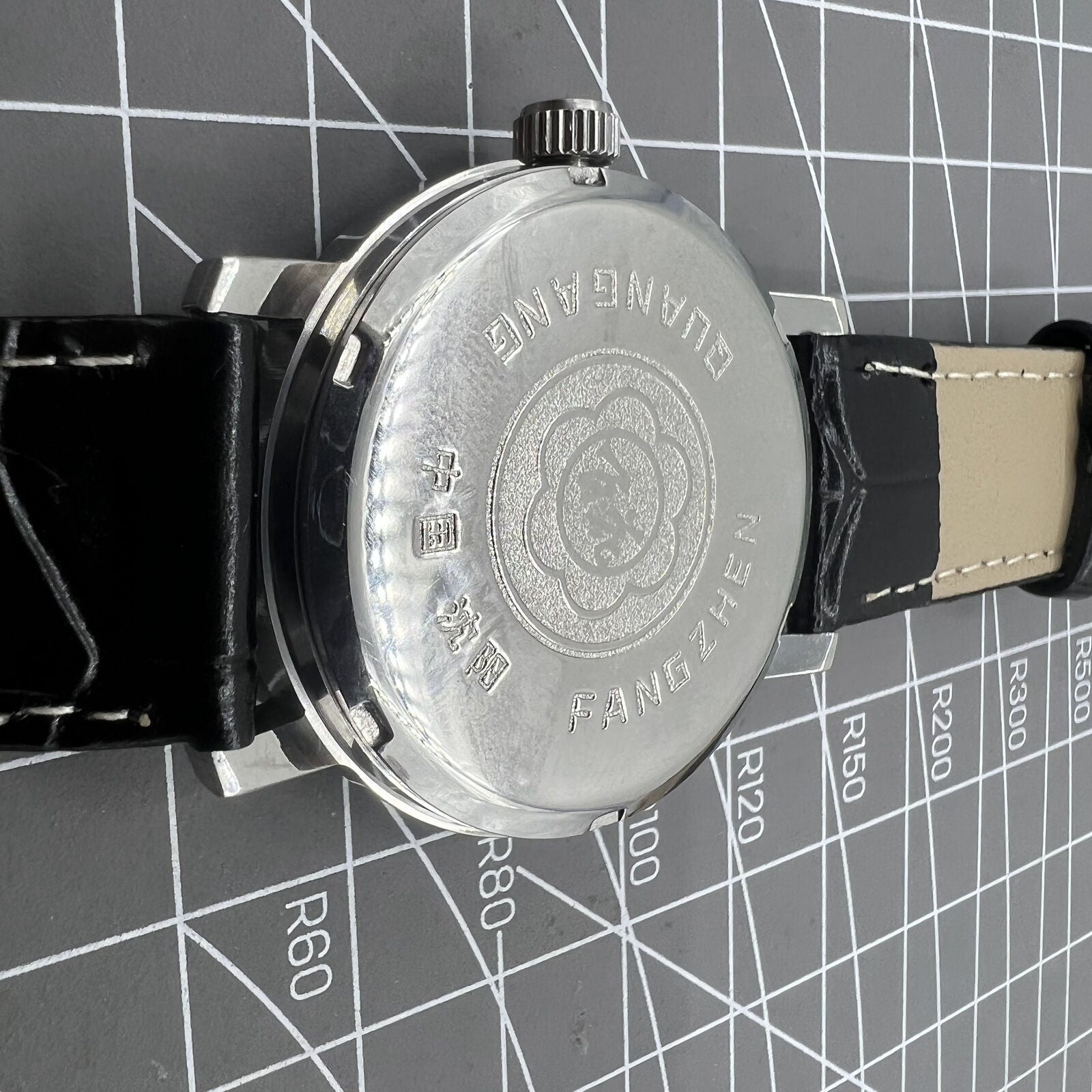 Baihua 37mm manual mechanical watch with silver dial, 19 jewels, shock-resistant for lasting precision.