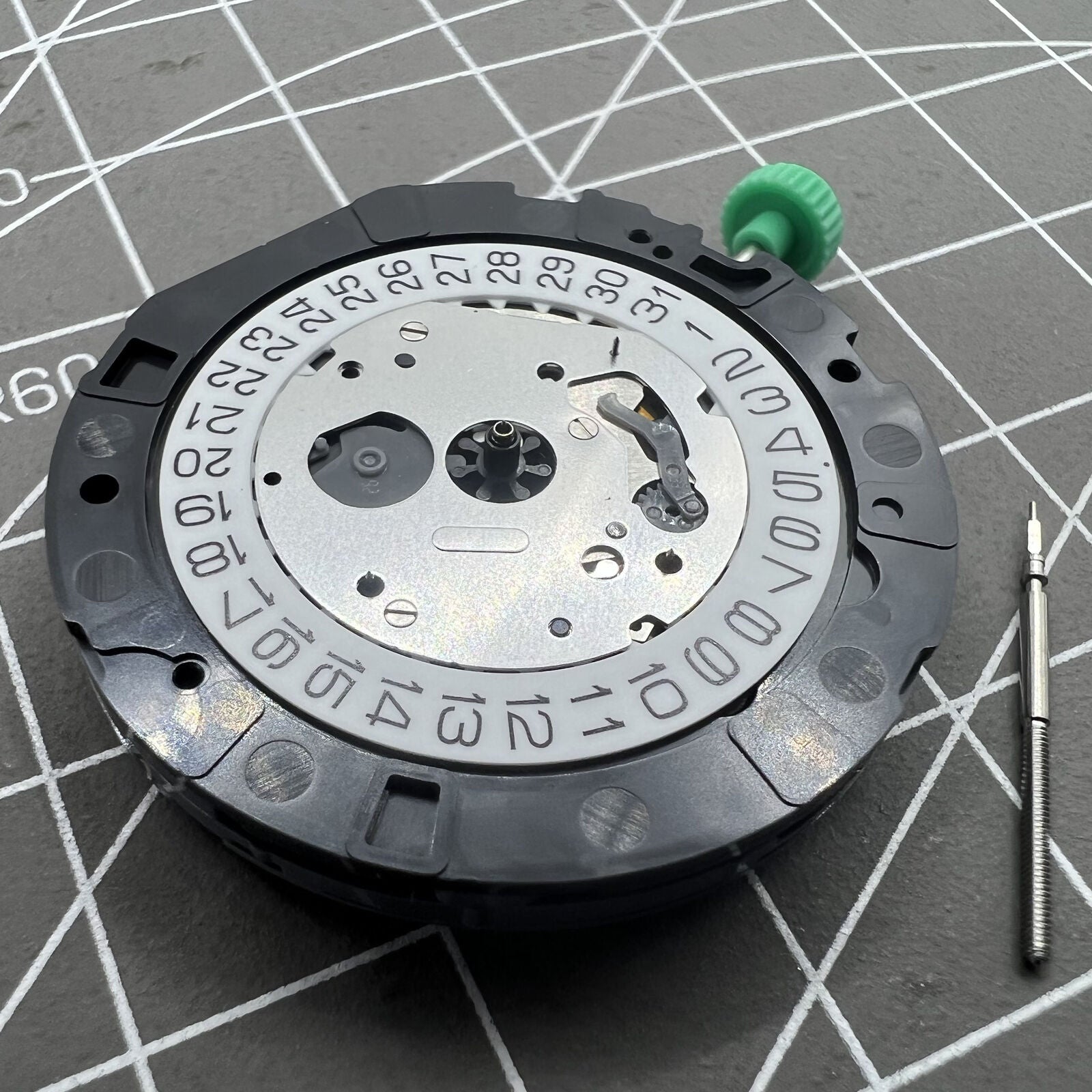 Miyota OS25 quartz movement with date display at 4 o'clock, reliable Japanese watch mechanism