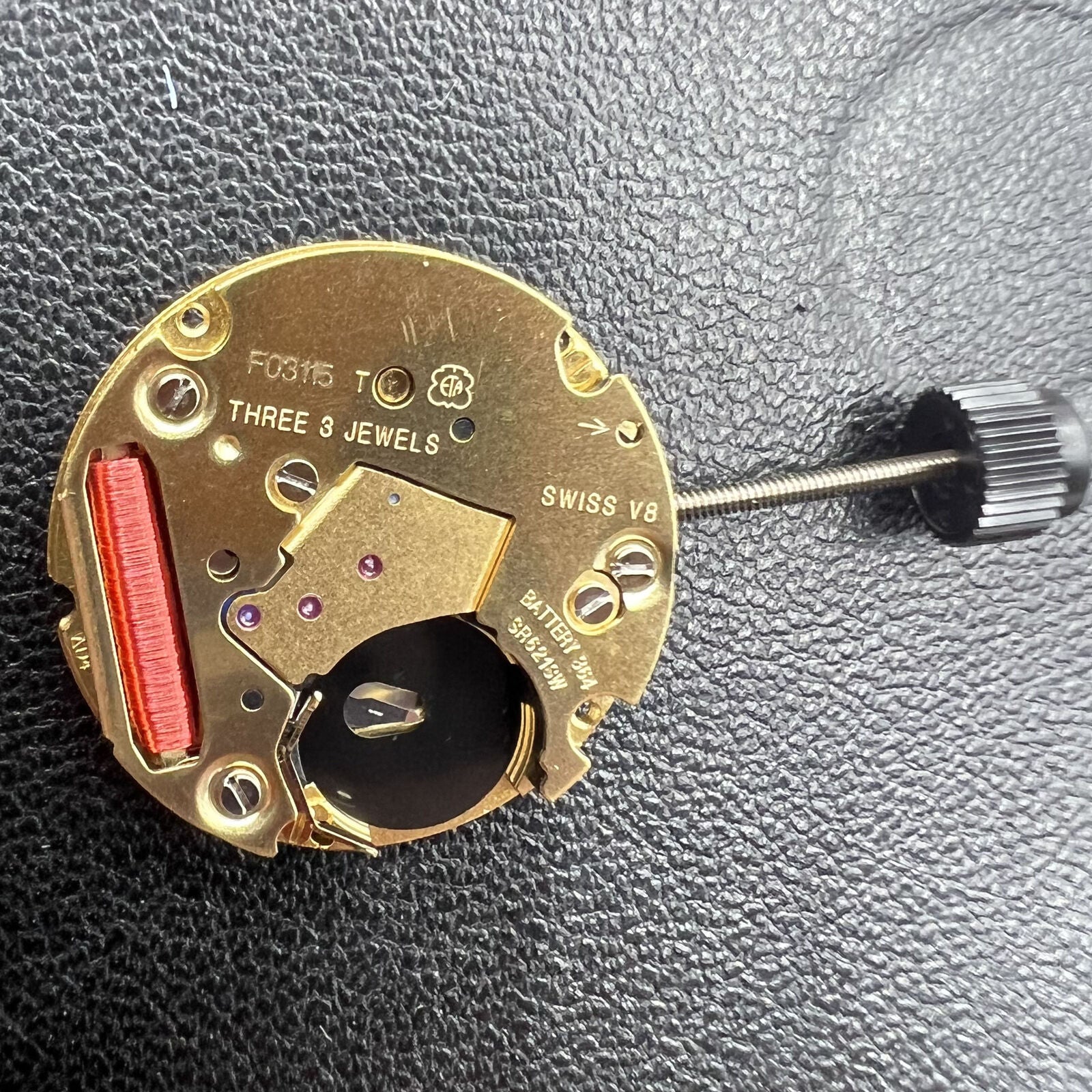 ETA F03.115 quartz watch movement with 3 hands and date display, precision timing by ETA brand.