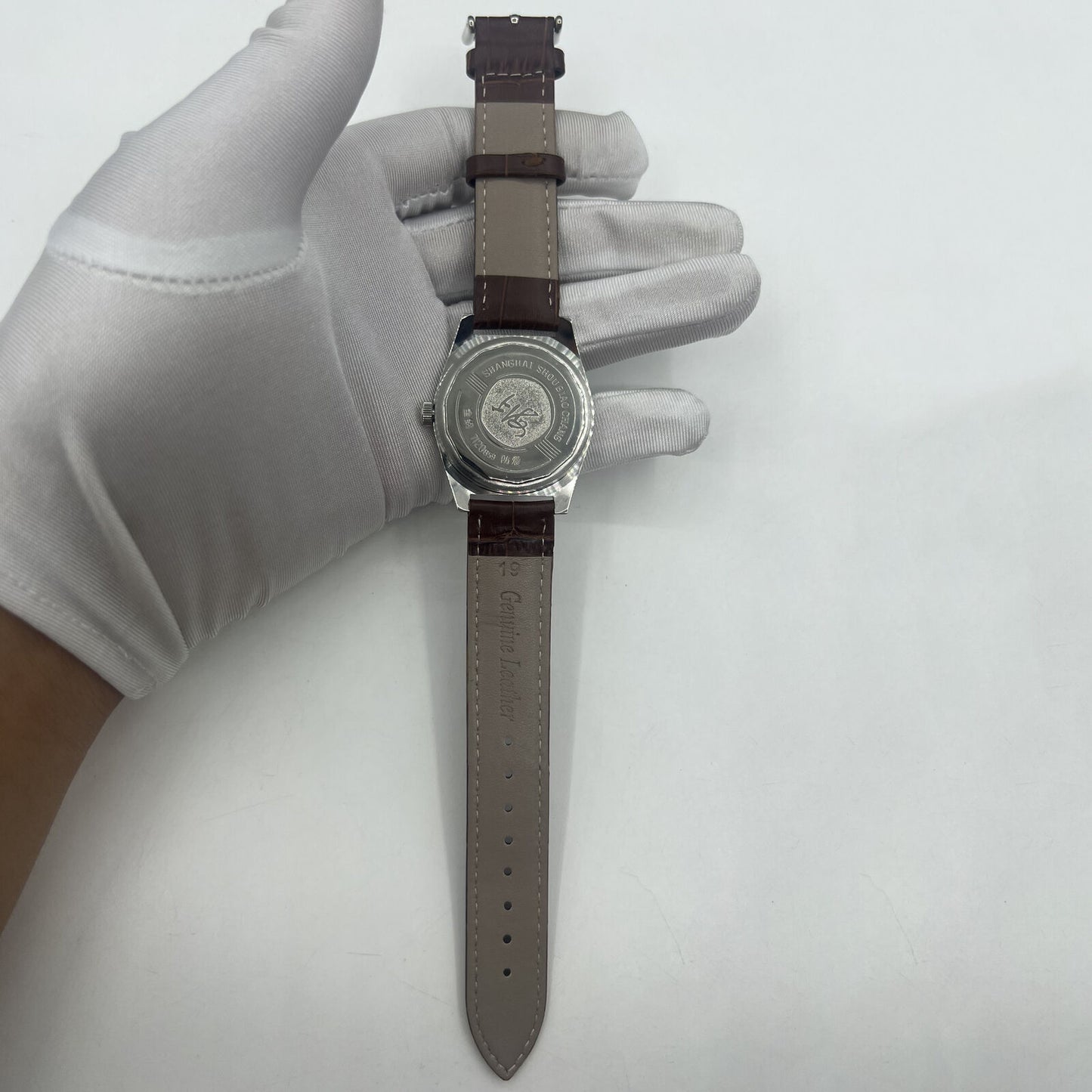 Shanghai Factory 38mm manual mechanical watch with white dial, classic 3-hand design, 19 jewels for precision.