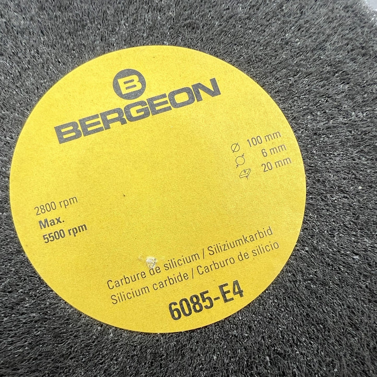 Swiss Bergeon 6085-E4 fine abrasive metal finishing wheel for precise watch polishing and satin finish.