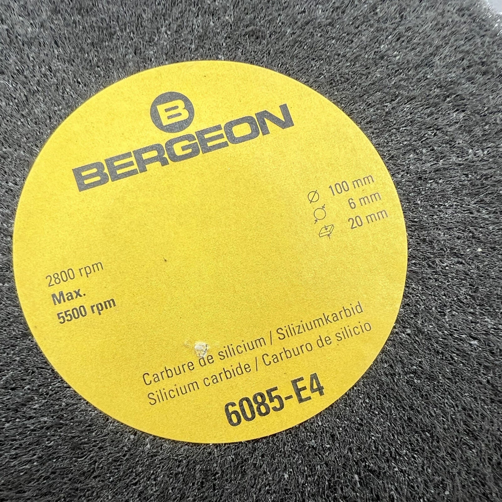 Swiss Bergeon 6085-E4 fine abrasive metal finishing wheel for precise watch polishing and satin finish.