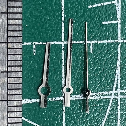 Silver and black trimmed long watch hands, compatible with NH35/NH36/4R/7S movements, no lume finish for classic timepieces.