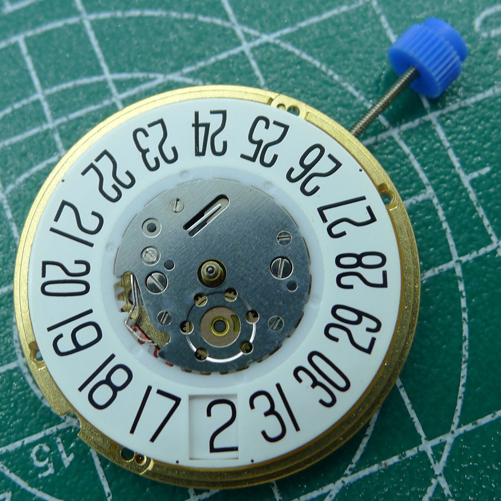 Swiss ETA F06.161 quartz watch movement with white dial, 3 hands, and date at 6, ideal for repair.