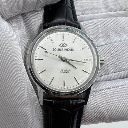 Beijing 36mm Double Rhomb manual watch with silver case and silver nail strap, classic style for elegant wear.