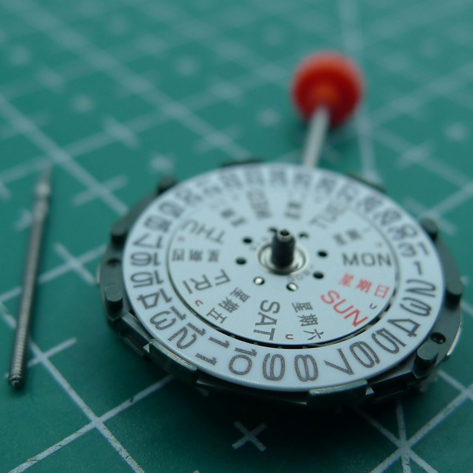 Miyota/Citizen 2005 quartz watch movement with day-date, precision Japanese brand component for repairs.