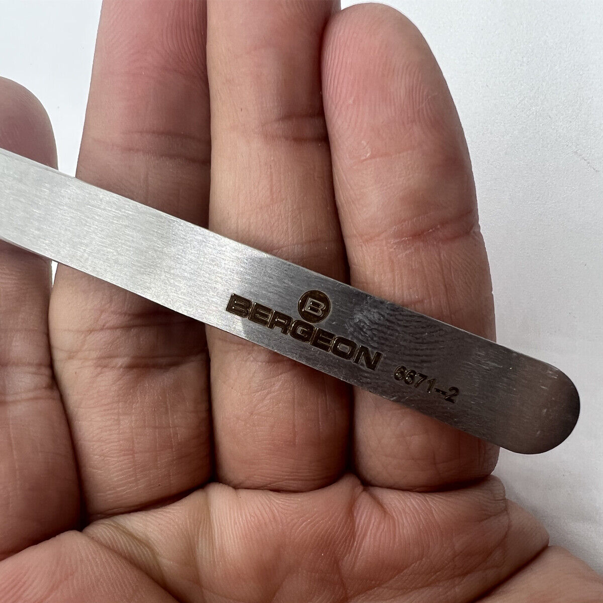 Bergeon 6671-2 anti-magnetic tweezers, precision tool for delicate Swiss watch repairs and adjustments.