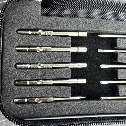 Precision screwdriver set with hex tools for watches and glasses repair, ergonomic grip.