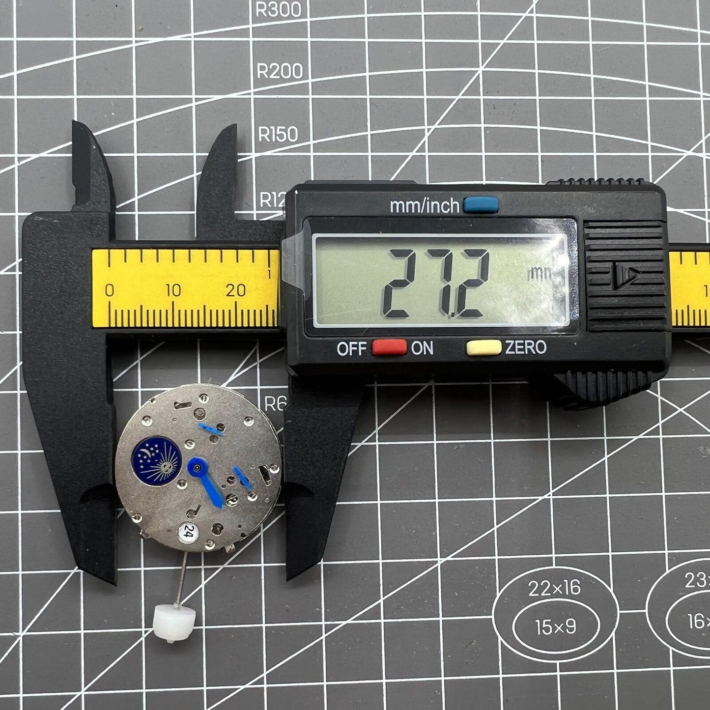 ST10 watch accessory with automatic mechanical movement, date display, and small seconds dials.