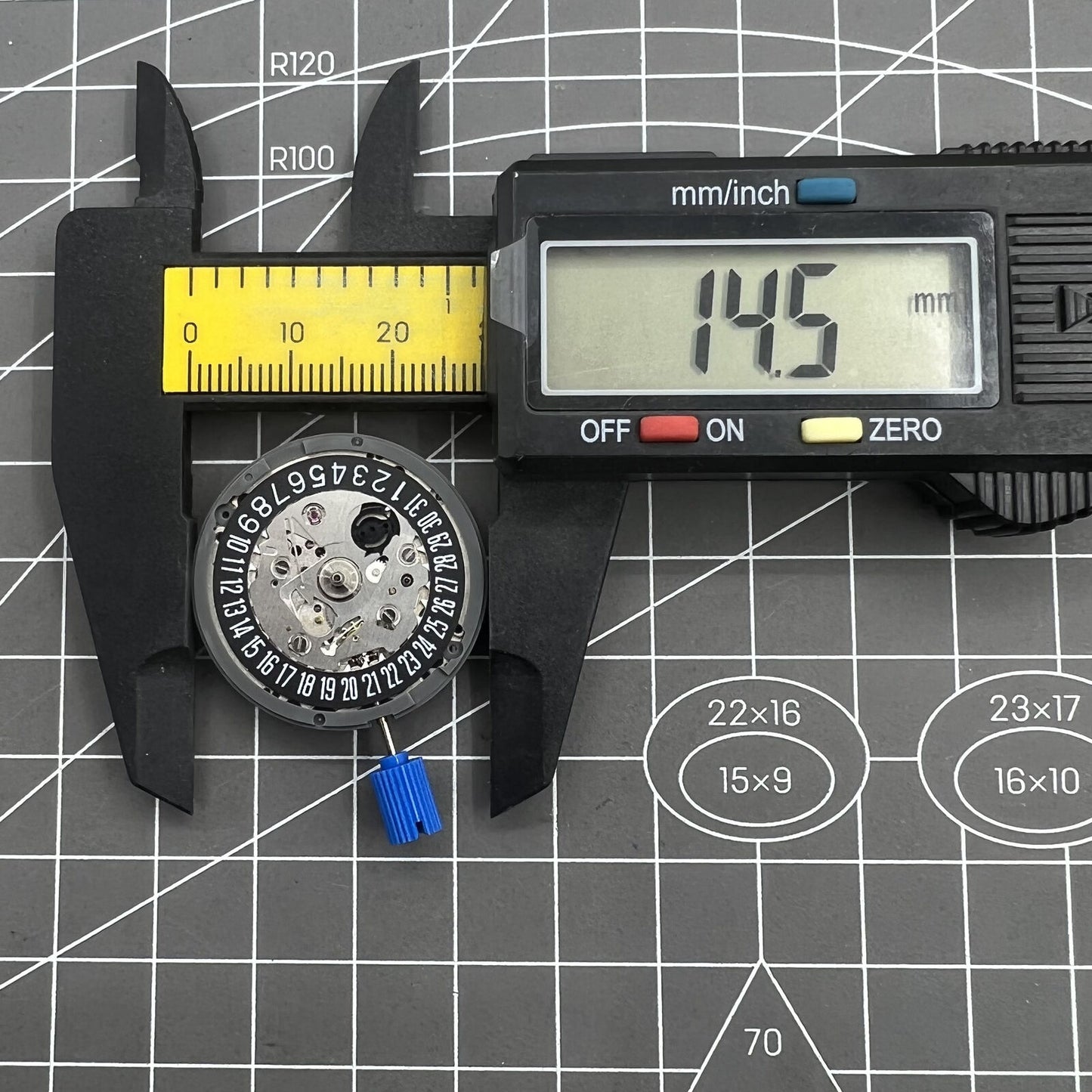 Black Seiko NH35 automatic watch movement with date display at 6 o'clock, precision self-winding mechanism.