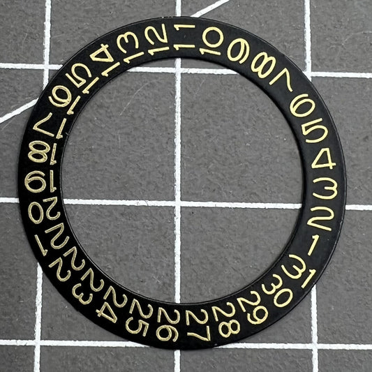 Golden date disk displaying characters on black background for Seiko NH35 NH36 movements